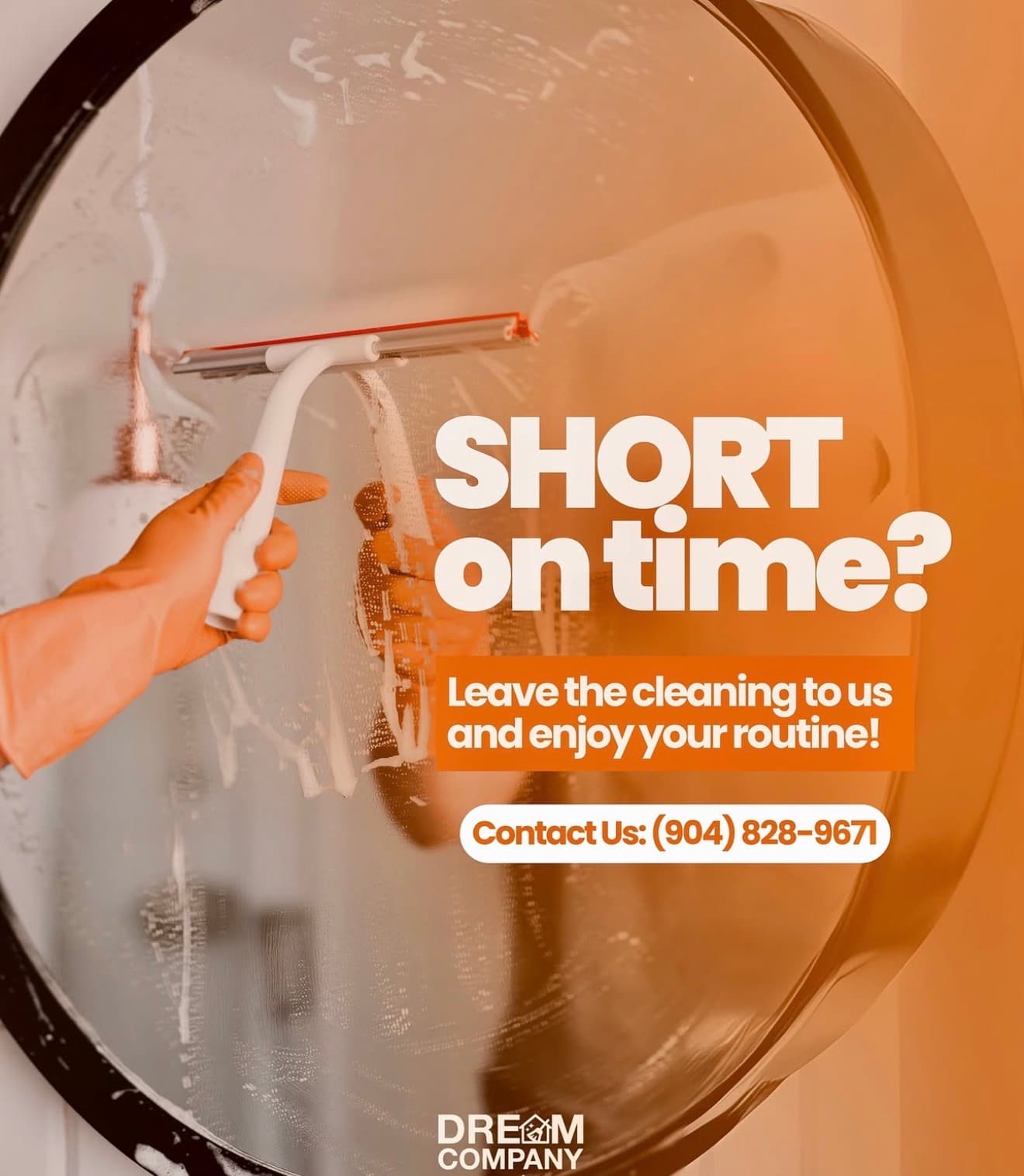 Gloved hand cleaning a soapy round mirror with a squeegee, advertising professional cleaning services.